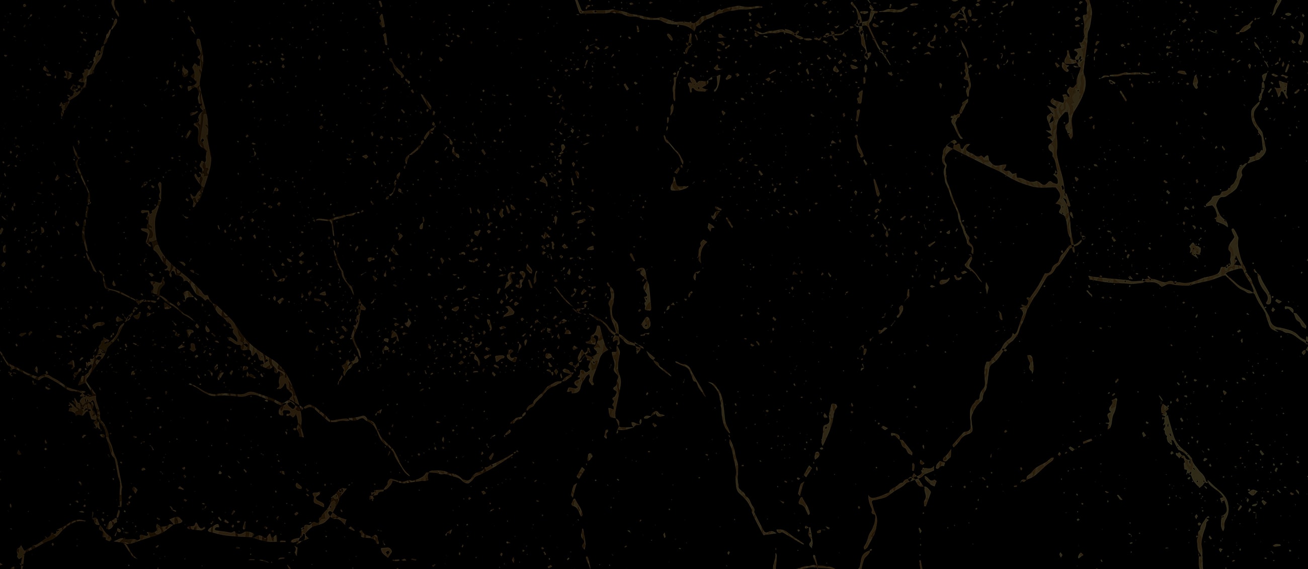 Black marble texture with gold veining.