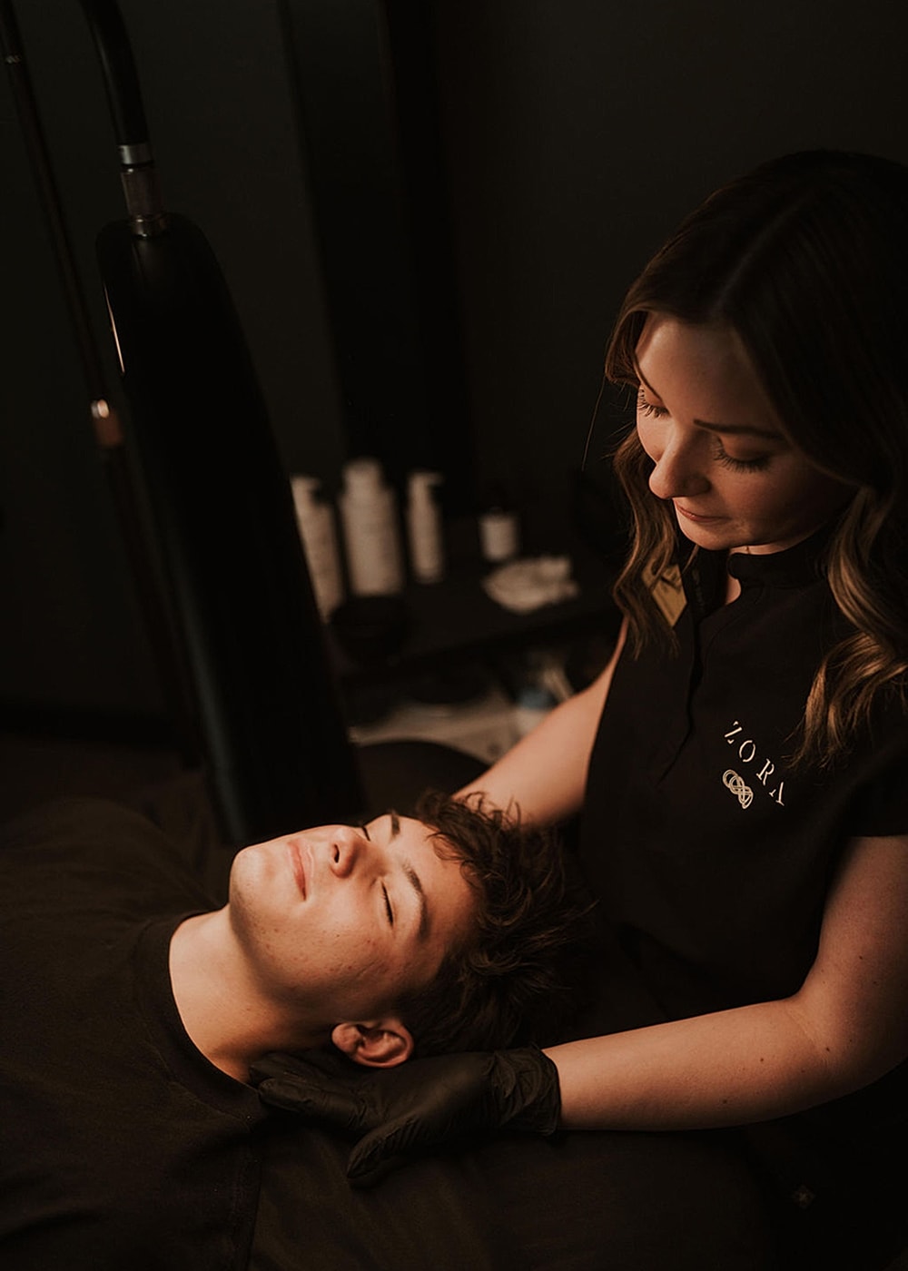 Woman enjoying a facial steam treatment.