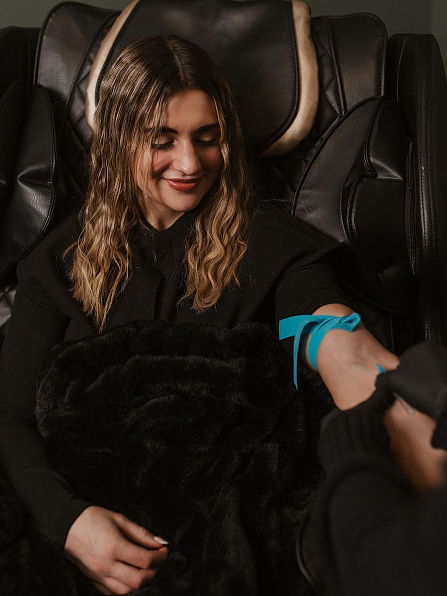 Woman relaxing while receiving a treatment.