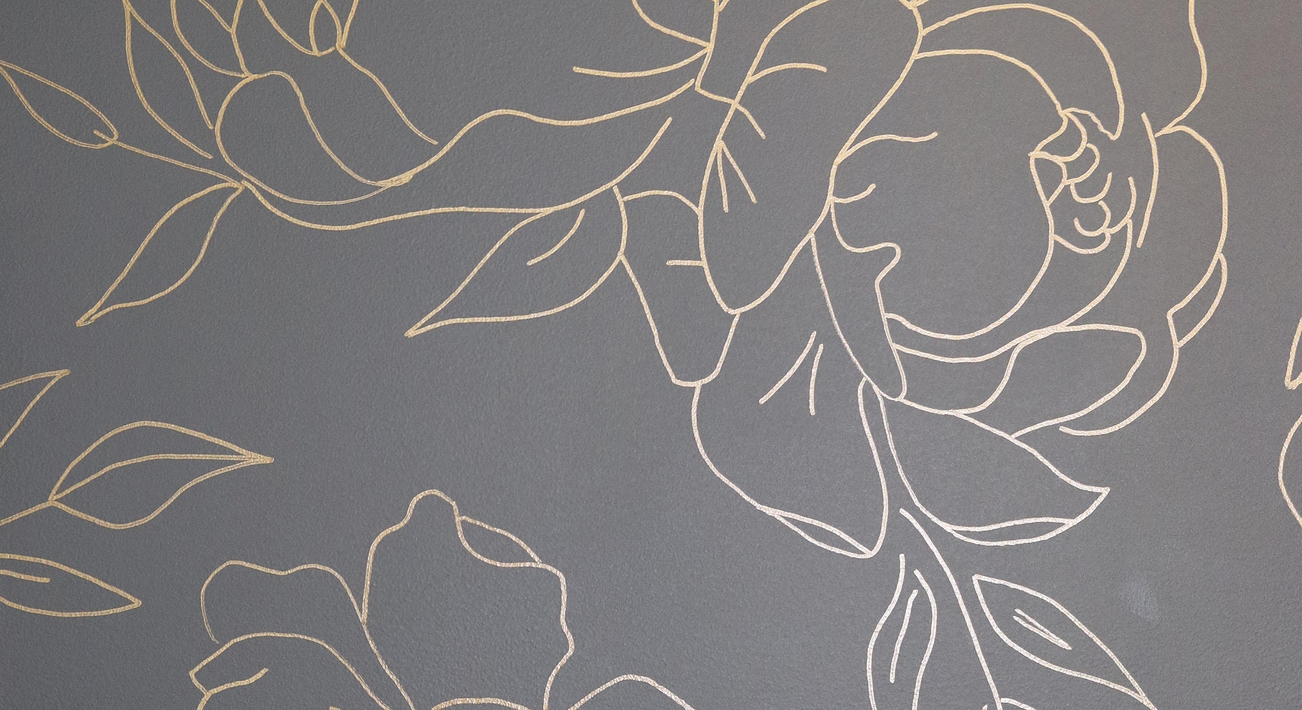 Floral design on gray background with gold accents.