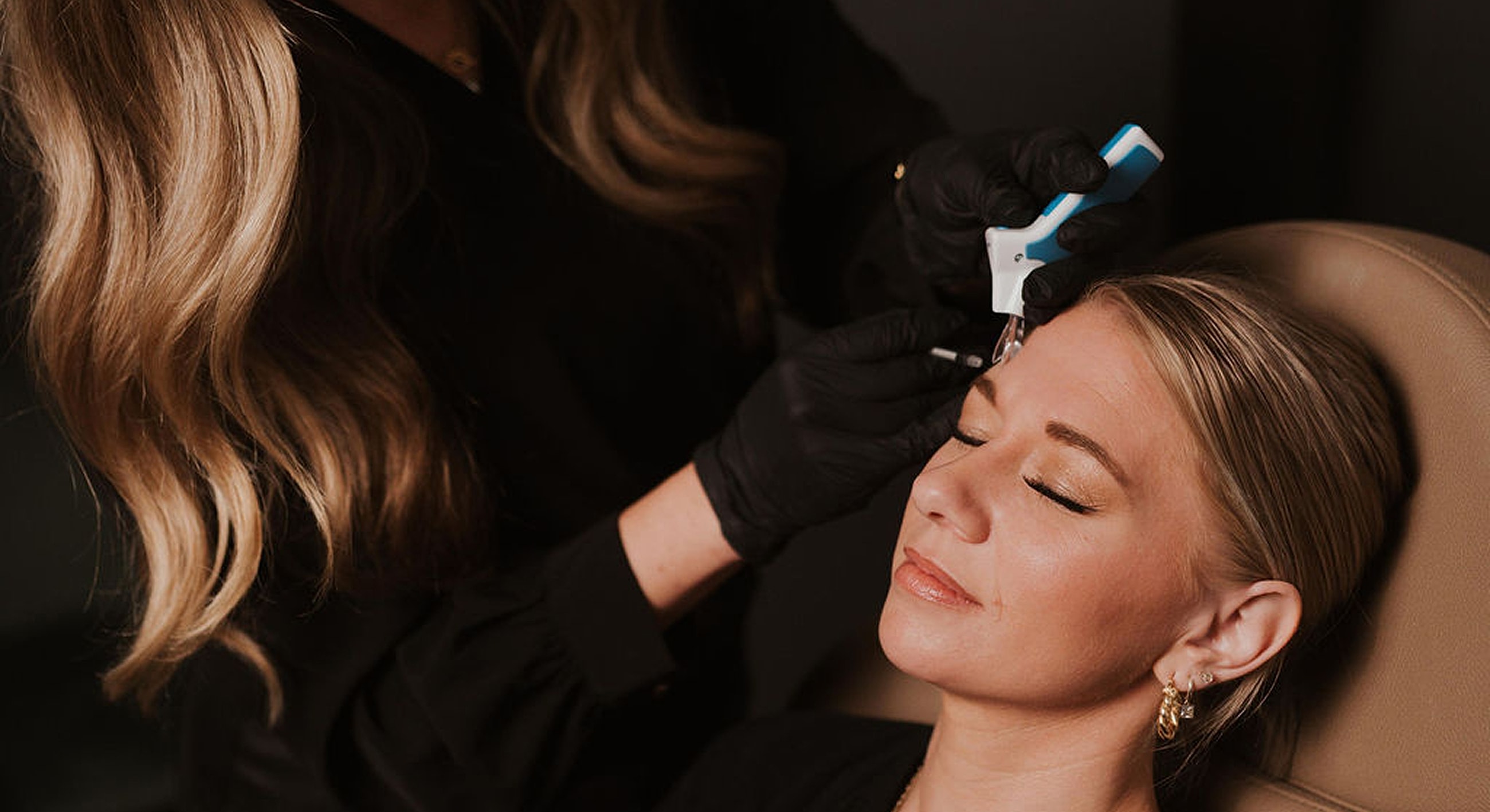 Beauty treatment in session at a salon.